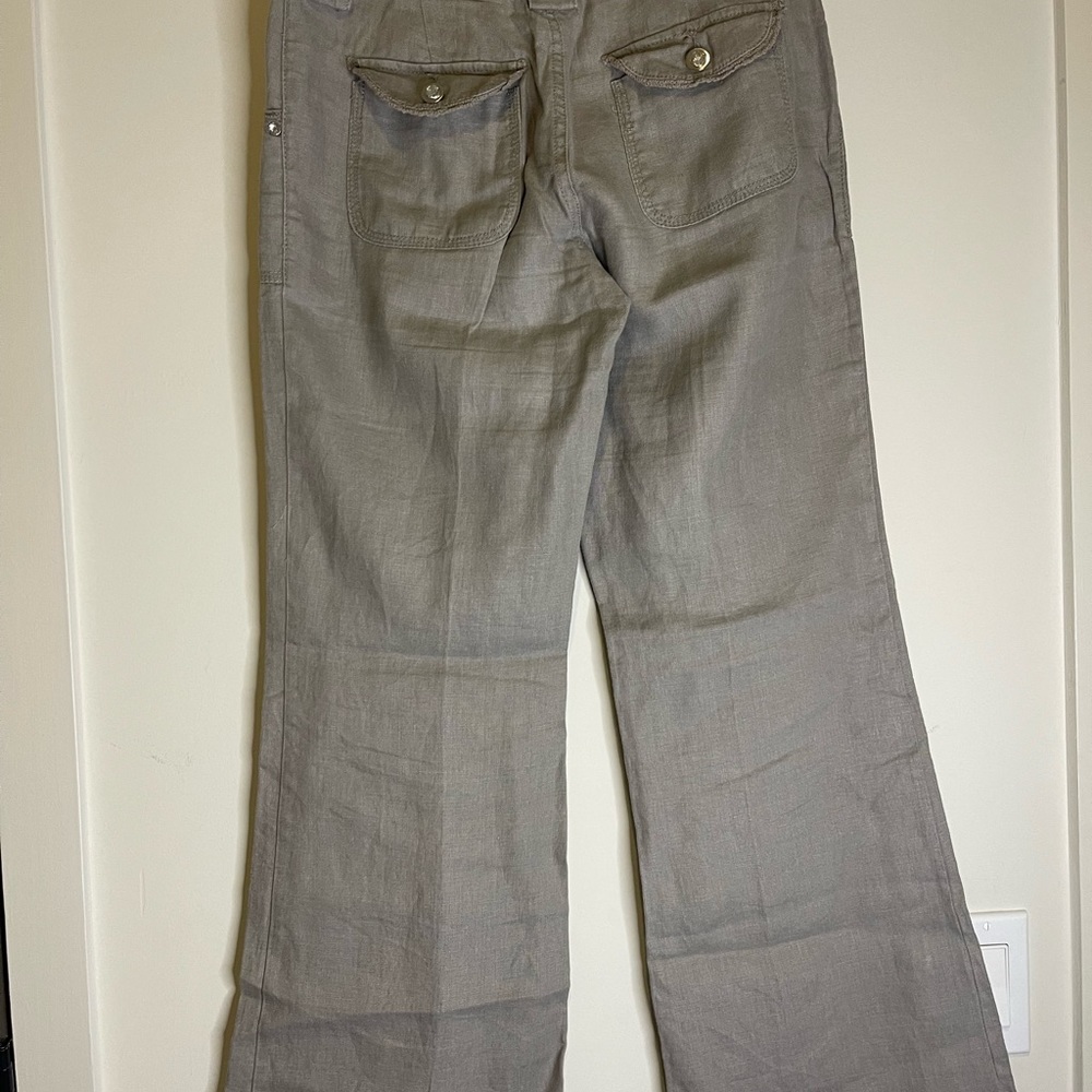 100% linen perfect for the summer beautiful accents shiny buttons front & back